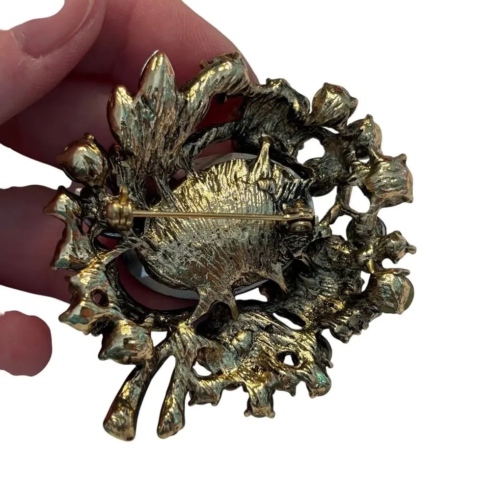 Vintage inspired chunky blue rhinestones brooch ornate silvertone AB finish